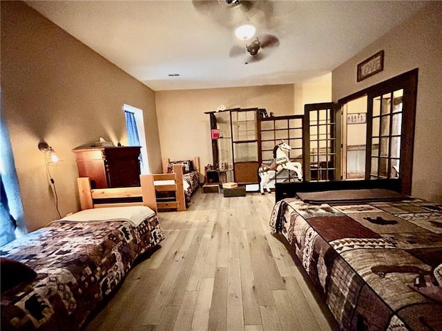 115 N 3rd St, Burlington, KS 66839 - bedroom featuring hardwood / wood-style flooring and french doors