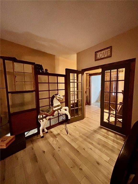 115 N 3rd St, Burlington, KS 66839 - mudroom with french doors and wood finished floors