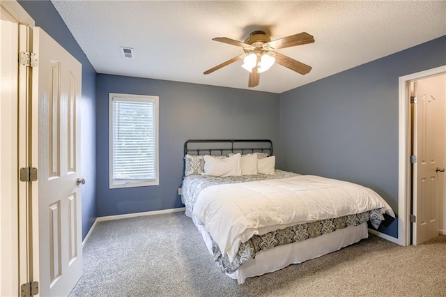 5204 W 166th St, Overland Park, KS 66085 - bedroom with carpet floors, baseboards, a ceiling fan, and a textured ceiling