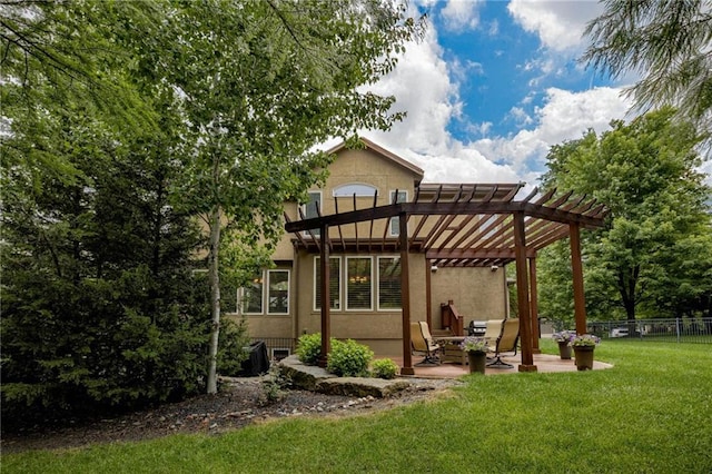 5204 W 166th St, Overland Park, KS 66085 - back of property with a pergola, a patio area, and stucco siding