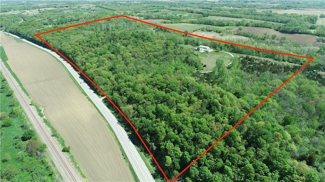 17795 K Hwy, Saint Joseph, MO 64505 - overview of rural landscape with property parcel outlined and a forest