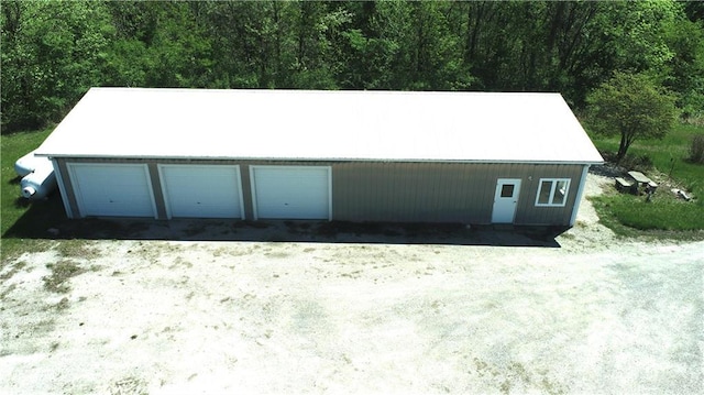 17795 K Hwy, Saint Joseph, MO 64505 - detached garage featuring a view of trees