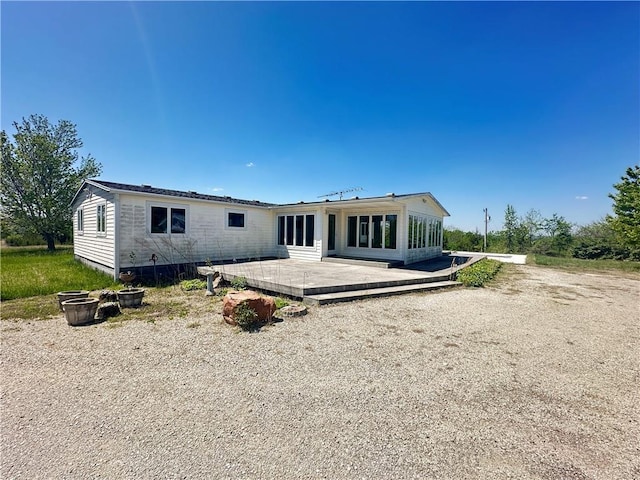 17795 K Hwy, Saint Joseph, MO 64505 - back of house featuring a deck