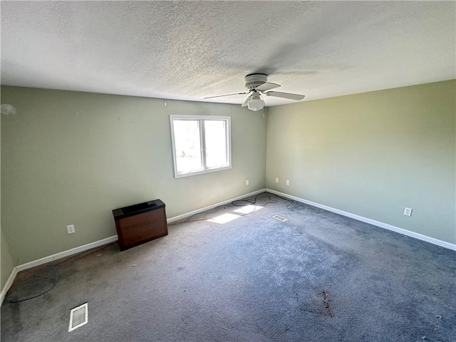 17795 K Hwy, Saint Joseph, MO 64505 - carpeted empty room featuring ceiling fan, baseboards, and a textured ceiling