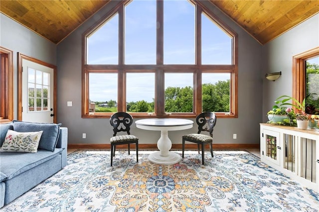 15405 161st St, Bonner Springs, KS 66012 - living area with lofted ceiling, wooden ceiling, healthy amount of natural light, and wood finished floors