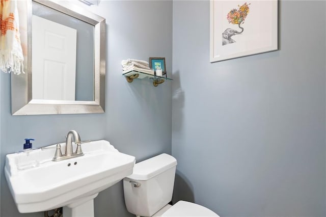 15405 161st St, Bonner Springs, KS 66012 - bathroom with toilet and a sink