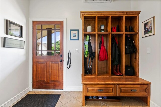 15405 161st St, Bonner Springs, KS 66012 - mudroom with light tile patterned flooring and a wall mounted air conditioner