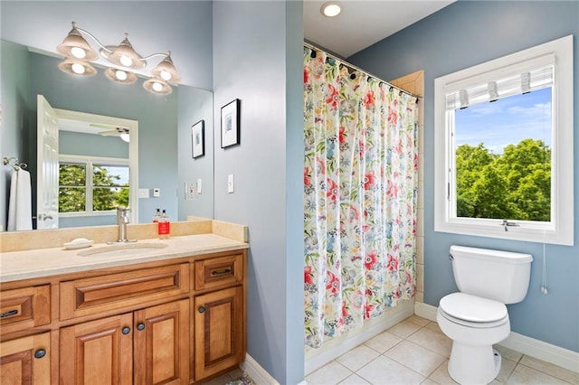 15405 161st St, Bonner Springs, KS 66012 - full bath with vanity, ceiling fan, and tile patterned flooring