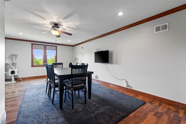15405 161st St, Bonner Springs, KS 66012 - dining room featuring ornamental molding, a ceiling fan, wood finished floors, a textured ceiling, and recessed lighting