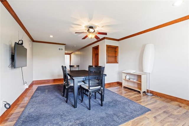 15405 161st St, Bonner Springs, KS 66012 - dining space featuring ceiling fan, crown molding, wood finished floors, and recessed lighting