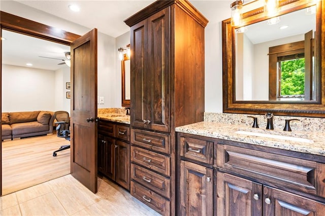 15405 161st St, Bonner Springs, KS 66012 - bathroom featuring double vanity, a ceiling fan, and recessed lighting