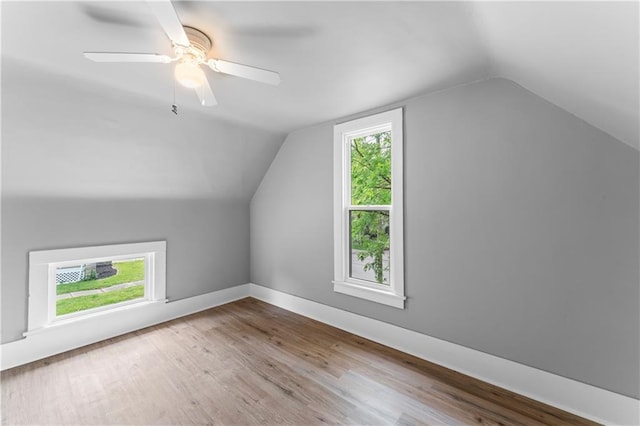 115 Brown Ave, Osawatomie, KS 66064 - additional living space featuring vaulted ceiling, wood finished floors, a ceiling fan, and baseboards