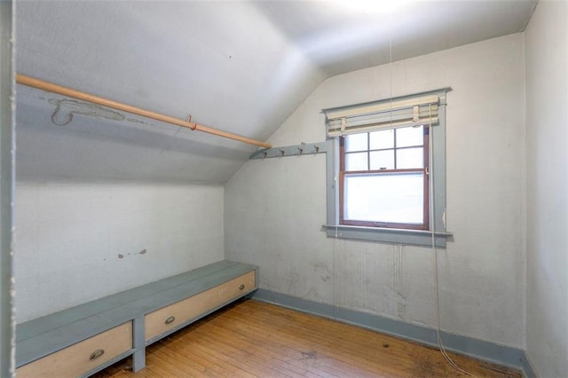12 W 57th Ter, Kansas City, MO 64113 - walk in closet featuring lofted ceiling and hardwood / wood-style flooring