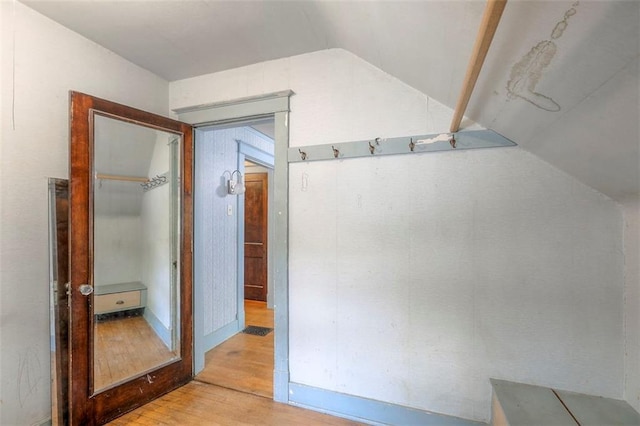 12 W 57th Ter, Kansas City, MO 64113 - bathroom with wood finished floors and vaulted ceiling