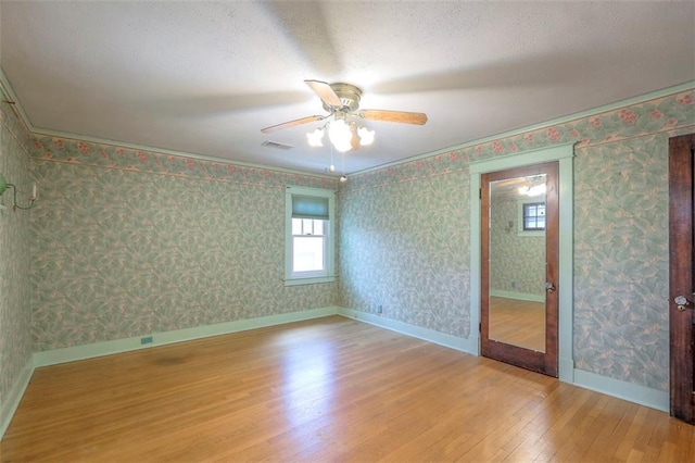 12 W 57th Ter, Kansas City, MO 64113 - spare room featuring hardwood / wood-style flooring and ceiling fan