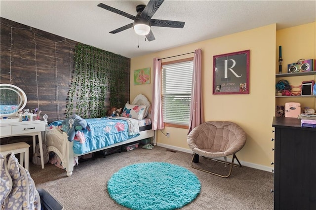 3223 SW Amber Ct, Lees Summit, MO 64082 - carpeted bedroom with a ceiling fan, a textured ceiling, and baseboards