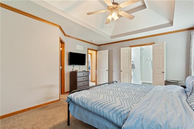 3223 SW Amber Ct, Lees Summit, MO 64082 - carpeted bedroom featuring a raised ceiling, baseboards, ornamental molding, and ceiling fan