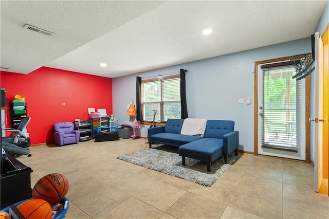 3223 SW Amber Ct, Lees Summit, MO 64082 - tiled living area with recessed lighting, a textured ceiling, and baseboards