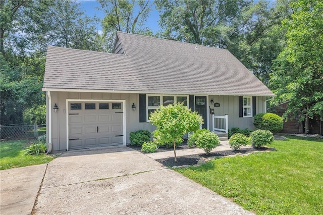 8005 W 91st St, Overland Park, KS 66212 - view of front of house featuring roof with shingles, a garage, and driveway