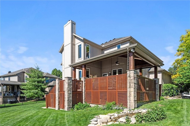 22404 S Roosevelt St, Spring Hill, KS 66083 - rear view of house featuring ceiling fan and a chimney