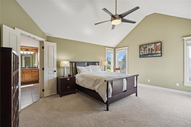 22404 S Roosevelt St, Spring Hill, KS 66083 - bedroom with light colored carpet, high vaulted ceiling, baseboards, ensuite bathroom, and ceiling fan