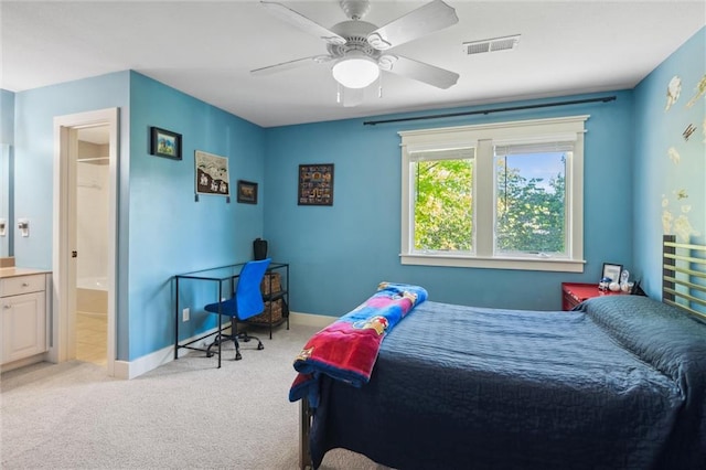 22404 S Roosevelt St, Spring Hill, KS 66083 - carpeted bedroom with connected bathroom, a ceiling fan, and baseboards