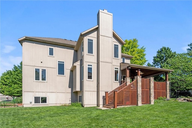 22404 S Roosevelt St, Spring Hill, KS 66083 - rear view of property featuring a chimney and stairway