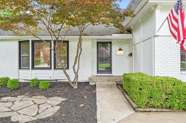 5000 W 96th St, Overland Park, KS 66207 - entrance to property with brick siding and a shingled roof