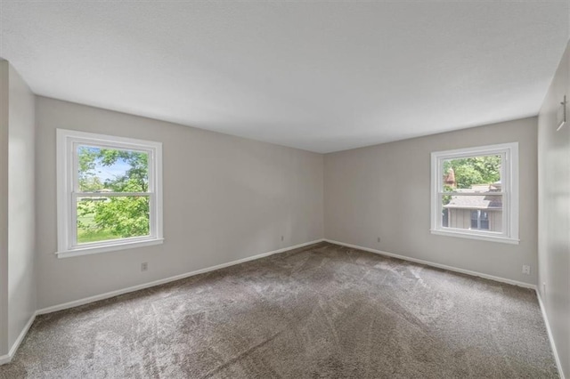 5000 W 96th St, Overland Park, KS 66207 - carpeted spare room featuring baseboards