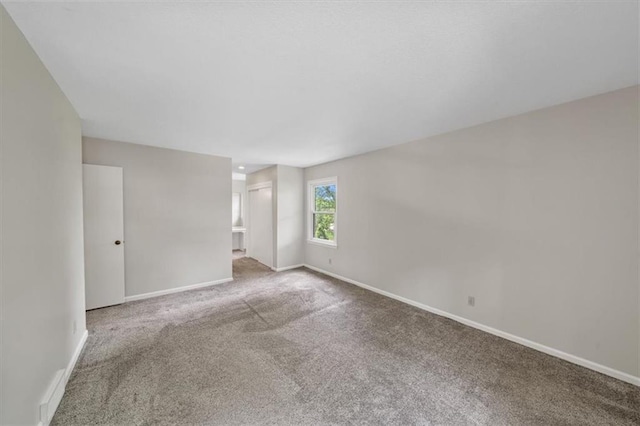 5000 W 96th St, Overland Park, KS 66207 - unfurnished room with carpet flooring and baseboards