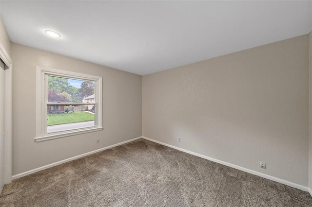 5000 W 96th St, Overland Park, KS 66207 - carpeted spare room featuring baseboards
