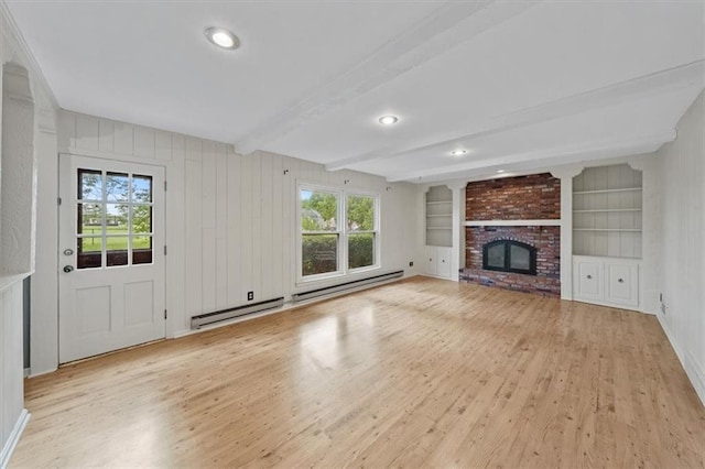 5000 W 96th St, Overland Park, KS 66207 - unfurnished living room featuring wood finished floors, beamed ceiling, a fireplace, recessed lighting, and built in shelves
