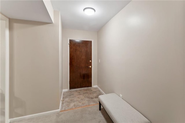 7616 W 59th Ter Unit 37, Overland Park, KS 66202 - doorway to outside featuring baseboards