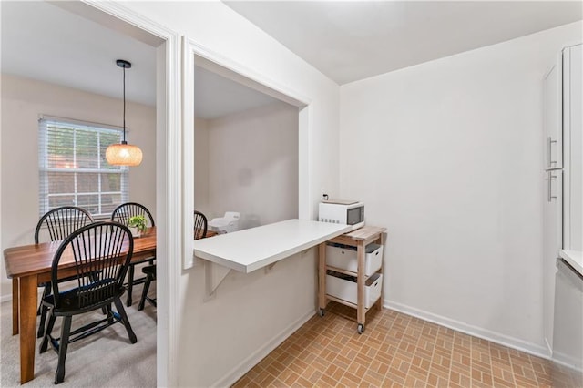 7616 W 59th Ter Unit 37, Overland Park, KS 66202 - office space featuring baseboards and brick patterned floors