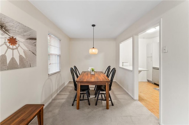 7616 W 59th Ter Unit 37, Overland Park, KS 66202 - dining room with baseboards and carpet flooring