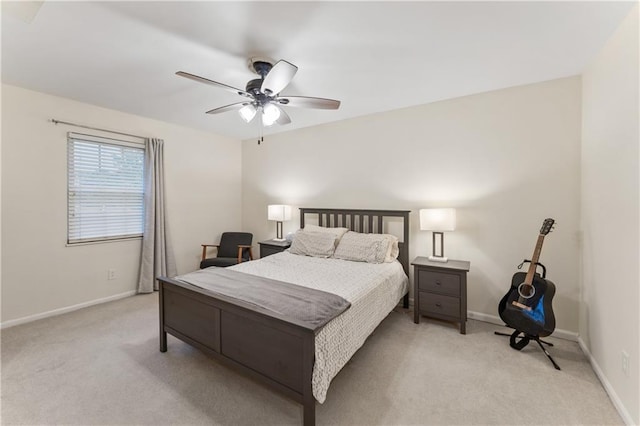 7616 W 59th Ter Unit 37, Overland Park, KS 66202 - bedroom with light colored carpet, baseboards, and ceiling fan