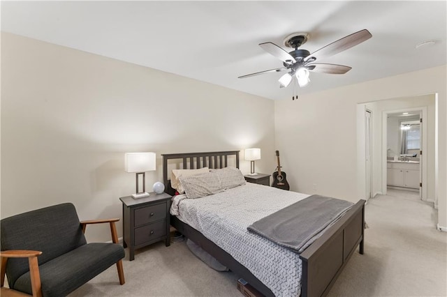 7616 W 59th Ter Unit 37, Overland Park, KS 66202 - bedroom featuring light carpet, ceiling fan, and ensuite bathroom