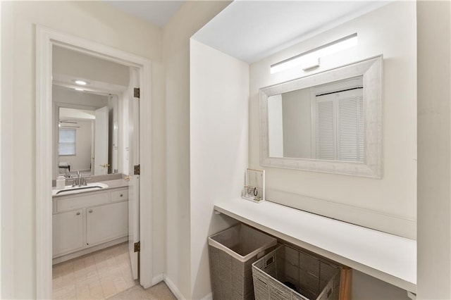 7616 W 59th Ter Unit 37, Overland Park, KS 66202 - bathroom featuring vanity and baseboards