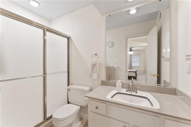 7616 W 59th Ter Unit 37, Overland Park, KS 66202 - full bath featuring toilet, a shower stall, vanity, and ceiling fan