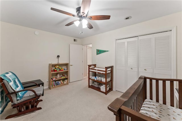 7616 W 59th Ter Unit 37, Overland Park, KS 66202 - bedroom featuring light colored carpet, a closet, a ceiling fan, and baseboards