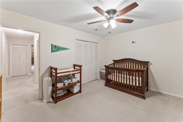 7616 W 59th Ter Unit 37, Overland Park, KS 66202 - carpeted bedroom featuring a closet, ceiling fan, and baseboards