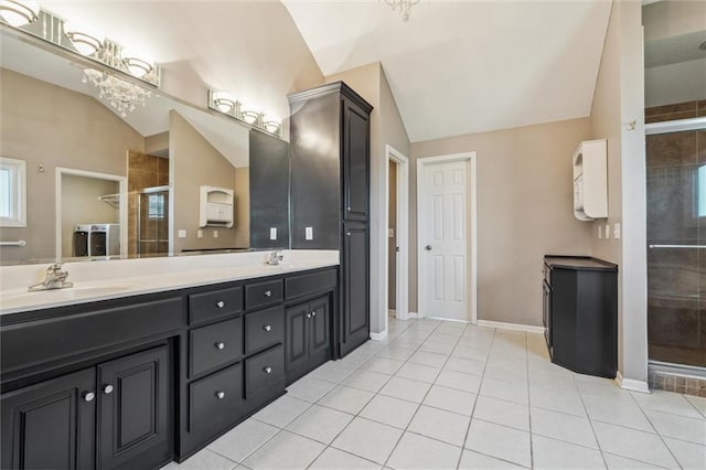 4528 N 108th St, Kansas City, KS 66109 - bathroom with lofted ceiling, a stall shower, double vanity, tile patterned flooring, and baseboards