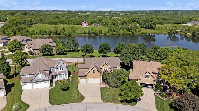 4528 N 108th St, Kansas City, KS 66109 - aerial perspective of suburban area with a nearby body of water and a heavily wooded area
