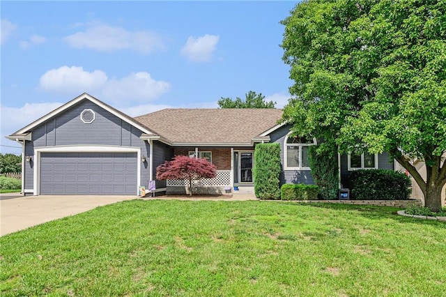 2721 SW Herefordshire Rd, Topeka, KS 66614 - ranch-style home with concrete driveway, a garage, and a front yard