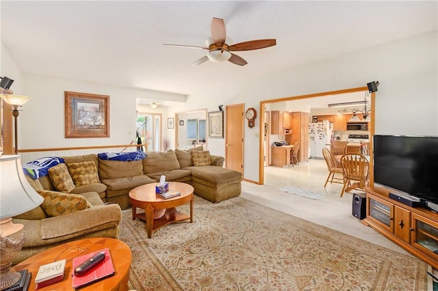 2721 SW Herefordshire Rd, Topeka, KS 66614 - living area featuring a ceiling fan and carpet floors
