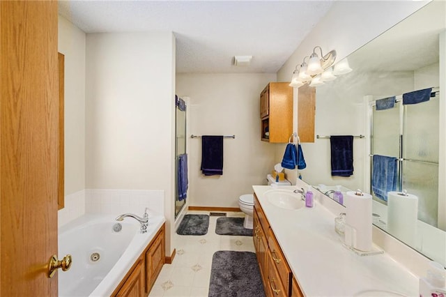 2721 SW Herefordshire Rd, Topeka, KS 66614 - full bath with a shower stall, double vanity, a tub with jets, toilet, and tile patterned flooring