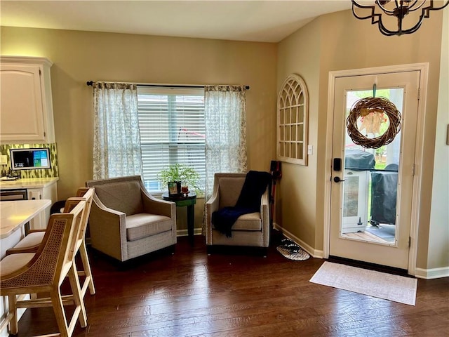 1402 NW Cedar Ct, Grain Valley, MO 64029 - entryway with dark wood finished floors and baseboards