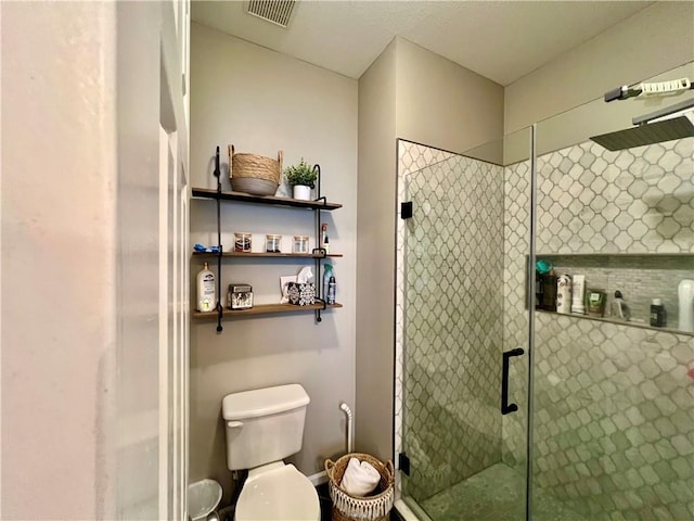 1402 NW Cedar Ct, Grain Valley, MO 64029 - bathroom featuring a stall shower and toilet