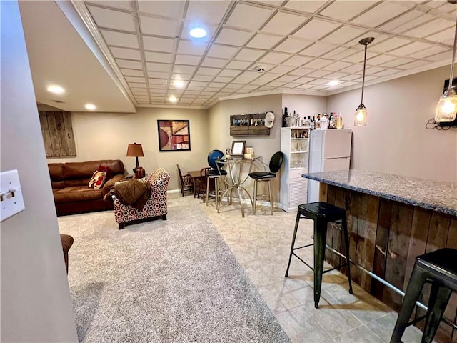 1402 NW Cedar Ct, Grain Valley, MO 64029 - living room featuring a bar and recessed lighting