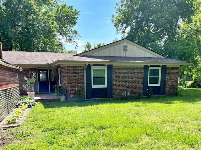 400 S 7th St, Arma, KS 66712 - single story home with a front lawn and brick siding
